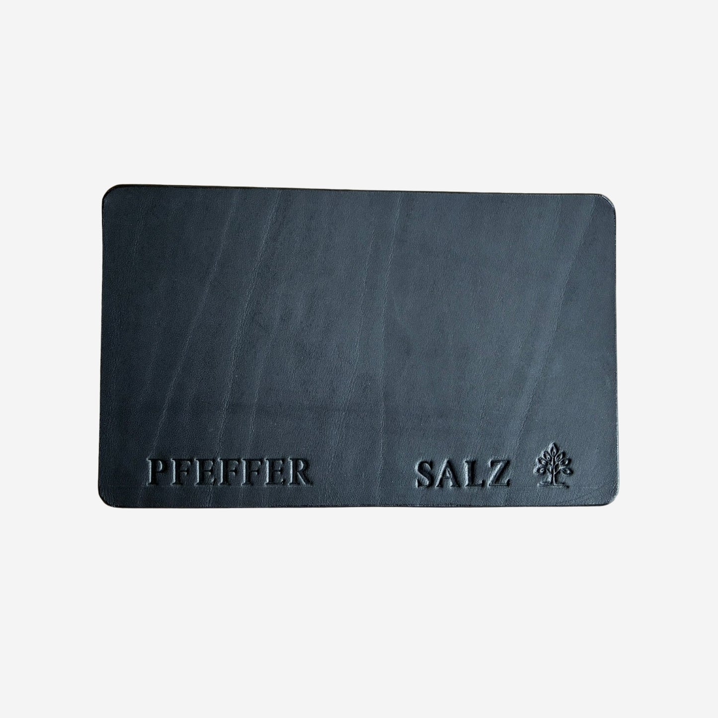 
                  
                    Lederunterlage für Salz & Pfeffer
                  
                